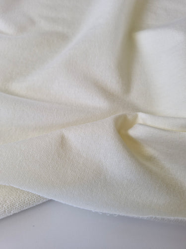 1.5m Snowtown White 87% merino 10% nylon 3% spandex 210g- terry looped backing 165cm wide