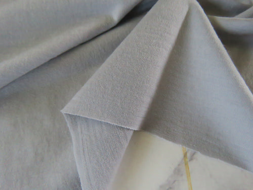 1.4m Toledo Pale grey 87% merino 13% core spun nylon jersey knit 162cm- longest piece left