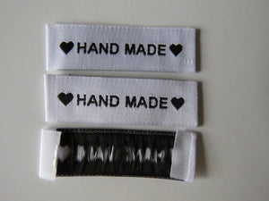 10 White Labels printed with "Hand Made" between Black Hearts Labels 50 x 15mm