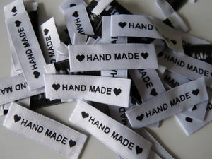 50 White Labels printed with "Hand Made" between Black Hearts Labels 50 x 15mm