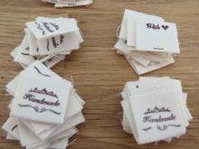 Load image into Gallery viewer, 50 Hand made between tiara  and  fancy scroll cotton flag labels. 2 x 2cm