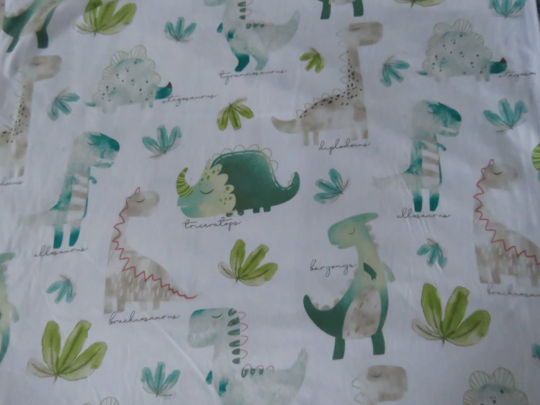 1m Dinosaur Print on white background 100% organic cotton jersey knit 112cm