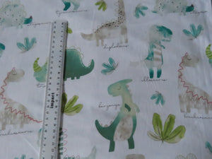 1m Dinosaur Print on white background 100% organic cotton jersey knit 112cm