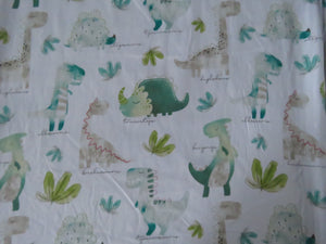 1m Dinosaur Print on white background 100% organic cotton jersey knit 112cm