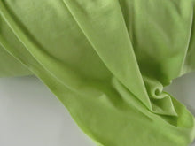 Load image into Gallery viewer, 1.5m Muted Lime Green 195g 100% merino jersey knit 150cm