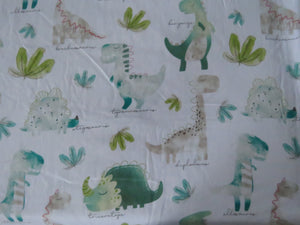 1m Dinosaur Print on white background 100% organic cotton jersey knit 112cm