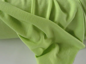 1.5m Muted Lime Green 195g 100% merino jersey knit 150cm