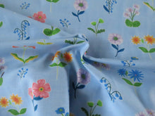 Load image into Gallery viewer, 1m Flower Print Floral on blue background organic cotton spandex jersey knit 155cm