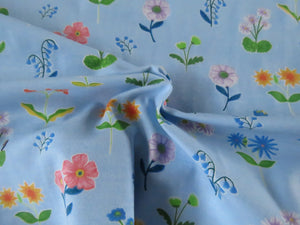 1m Flower Print Floral on blue background organic cotton spandex jersey knit 155cm