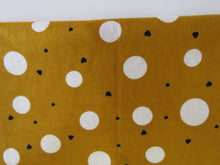 Load image into Gallery viewer, 1m Mustard with white spots and mini black hearts  100% organic cotton jersey knit 112cm