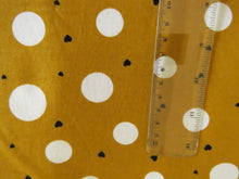 Load image into Gallery viewer, 1m Mustard with white spots and mini black hearts  100% organic cotton jersey knit 112cm