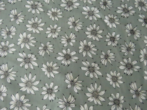 1m White flower on sage green background Bamboo spandex jersey knit 160cm