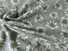 Load image into Gallery viewer, 1m White flower on sage green background Bamboo spandex jersey knit 160cm