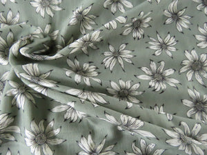 1m White flower on sage green background Bamboo spandex jersey knit 160cm