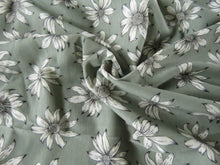 Load image into Gallery viewer, 1m White flower on sage green background Bamboo spandex jersey knit 160cm