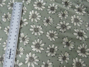 1m White flower on sage green background Bamboo spandex jersey knit 160cm