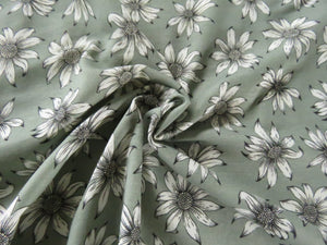 1m White flower on sage green background Bamboo spandex jersey knit 160cm