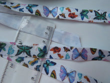 Load image into Gallery viewer, 1m Butterfly print on white Fold over Elastic FOE Fold over elastic 15mm wide