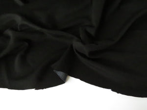 25cm Shuttle Black with Grey Honeycomb backing 58% merino 48% polyester 215g