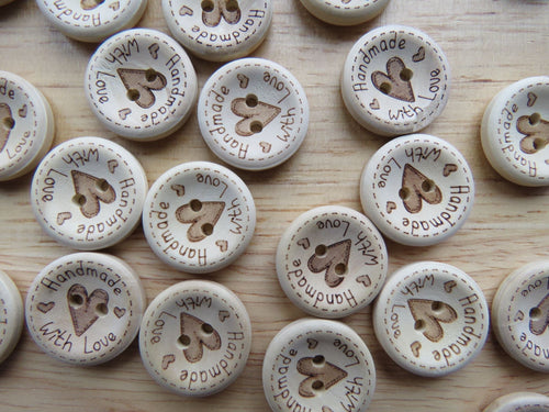 100 Large Heart in Centre with  Handmade with love on circumference 15mm buttons