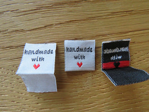 10 White Handmade with red heart 2 x 2cm satin labels.