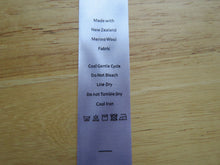 Load image into Gallery viewer, 20 White Satin washing instructions/ Made with New Zealand Merino wool labels