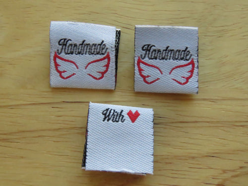 25 White Handmade 2 wings and with heart symbol for love on back satin flag label