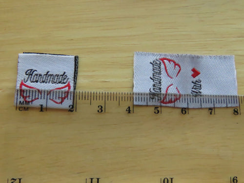 10 White Handmade 2 wings and with heart symbol for love on back satin flag label