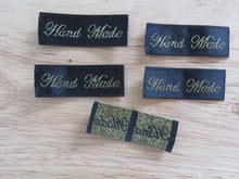 Load image into Gallery viewer, 100 Hand Made in Cursive Font Black Woven labels. 40x 15mm