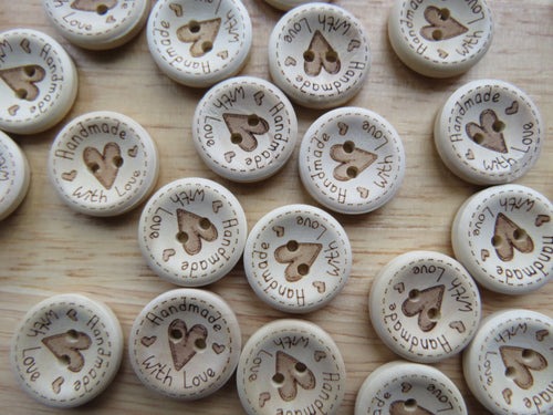 8 x 25mm Large Heart in Centre with  Handmade with love on circumference buttons